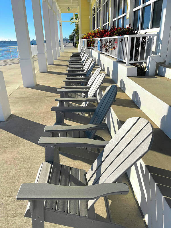 Chairs Poster featuring the photograph Line of Adirondack Chairs by Debra and Dave Vanderlaan