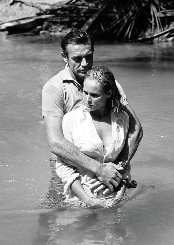 1960s Poster featuring the photograph SEAN CONNERY and URSULA ANDRESS in DR. NO -1962- UNITED ARTISTS by Album