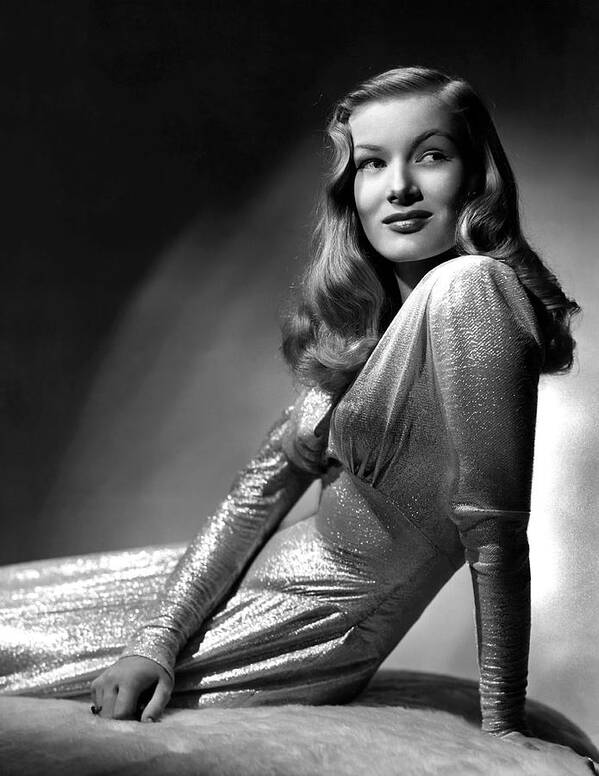 Veronica Lake Poster featuring the photograph VERONICA LAKE in THIS GUN FOR HIRE -1942-, directed by FRANK TUTTLE. by Album