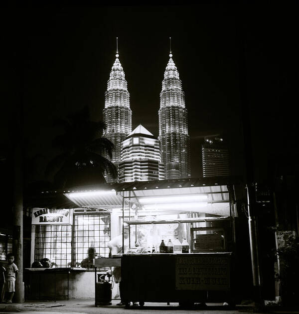 Petronas Towers Poster featuring the photograph Kampung Baru Night by Shaun Higson