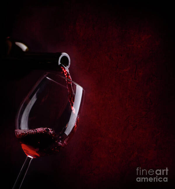 Wine Poster featuring the photograph Red wine pouring in wineglass by Jelena Jovanovic
