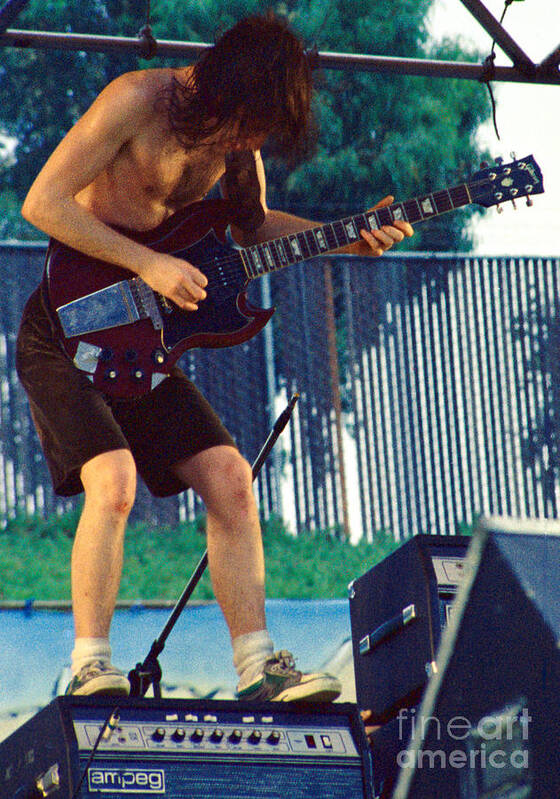 Angus Young Poster featuring the photograph Angus Young of A C D C at Day on the Green Monsters of Rock by Daniel Larsen
