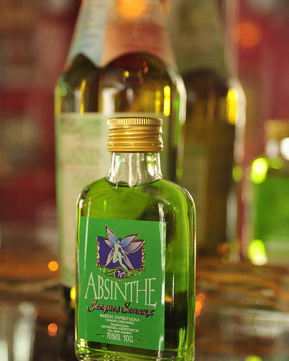 Absinthe Poster featuring the photograph Green Absinthe in small bottle by Matthias Hauser