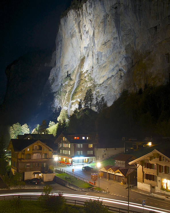 Lauterbrunnen Poster featuring the photograph Staubbach Falls at Night in Lauterbrunnen Switzerland by Owen Weber