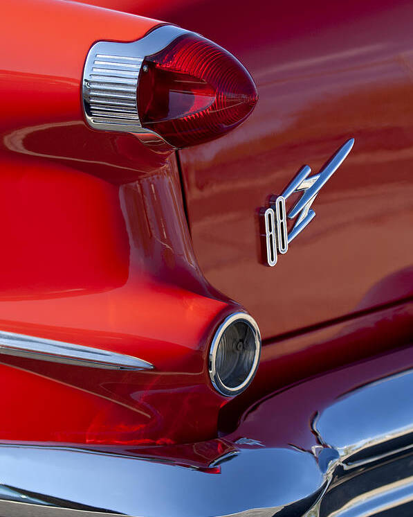 1956 Oldsmobile 88 Poster featuring the photograph 1956 Oldsmobile 88 Taillight Emblem by Jill Reger
