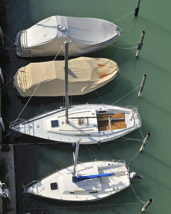 Boats Poster featuring the photograph Boats and water from above by Matthias Hauser