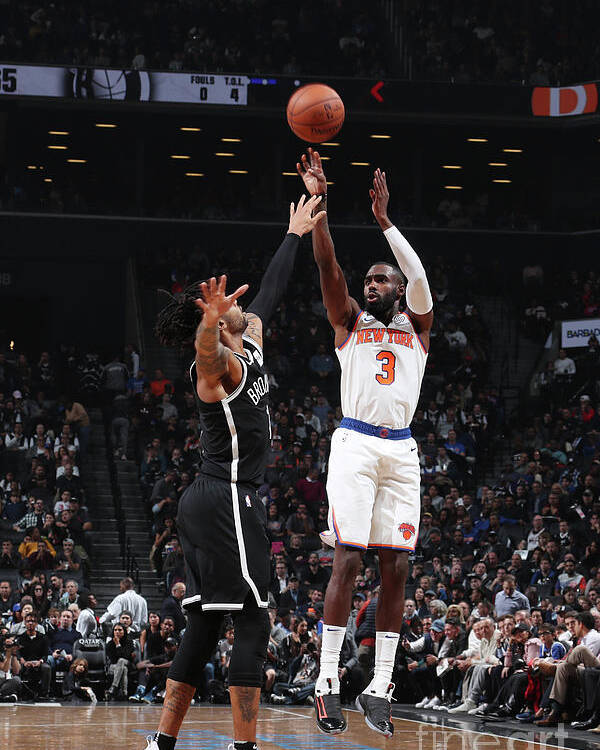 Tim Hardaway Jr Poster featuring the photograph New York Knicks V Brooklyn Nets by Nathaniel S. Butler