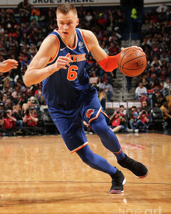 Kristaps Porzingis Poster featuring the photograph New York Knicks V New Orleans Pelicans by Layne Murdoch
