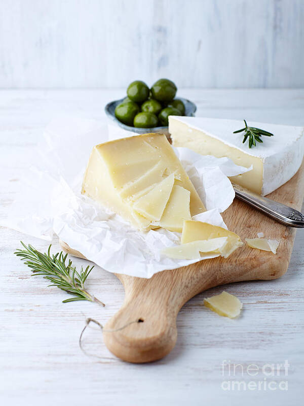Chopping Board Poster featuring the photograph Pecorino And Brie Cheese On A Kitchen by Barbara Dudzinska