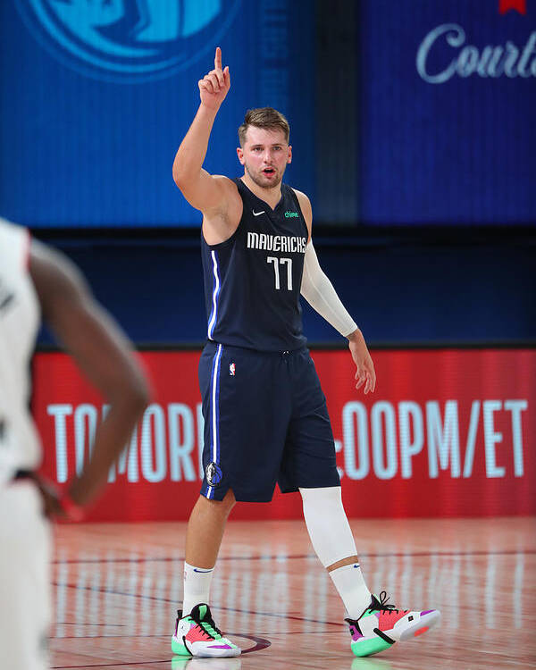 Luka Doncic Poster featuring the photograph LA Clippers v Dallas Mavericks - Game Four by Joe Murphy