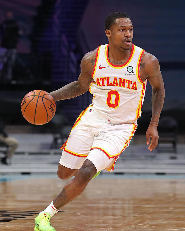 Brandon Goodwin Poster featuring the photograph Atlanta Hawks v Charlotte Hornets by Brock Williams-Smith