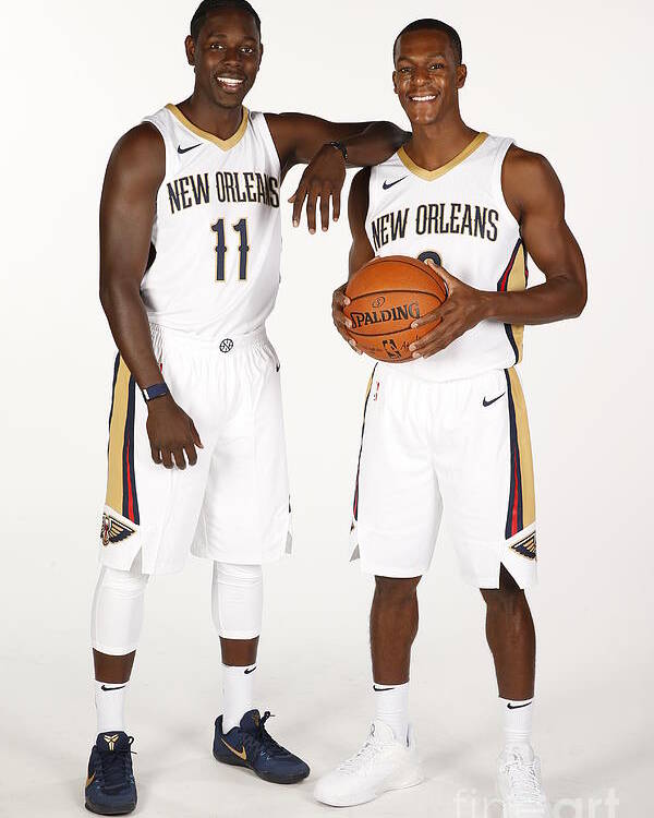 Media Day Poster featuring the photograph Jrue Holiday and Rajon Rondo by Jonathan Bachman