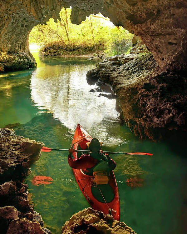 Kayak Poster featuring the photograph paddling in Cave Spring by Robert Charity