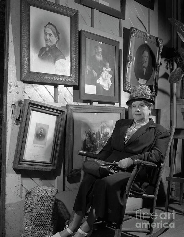Genealogy Poster featuring the photograph Woman seated in front of portraits of family members, 1946. by The Harrington Collection