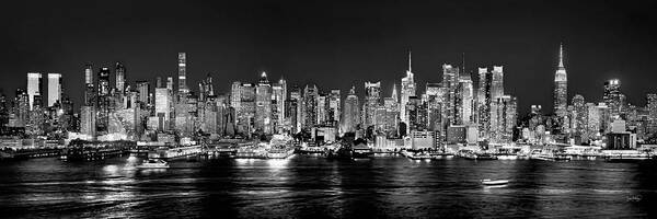 New York City Skyline At Night Poster featuring the photograph New York City NYC Skyline Midtown Manhattan at Night Black and White by Jon Holiday