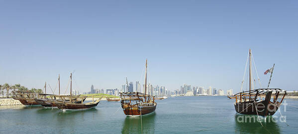 Dhow Poster featuring the photograph Panoramic dhows and Qatar skyline by Paul Cowan