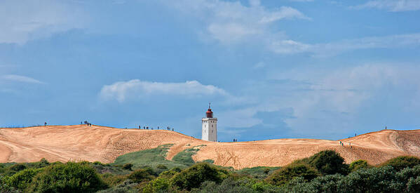 Lighthouse Poster featuring the photograph Lighthouse on sand dunes by Mike Santis
