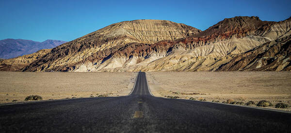 Road Poster featuring the photograph Lonely Road In Death Valley National Park In California #12 by Alex Grichenko