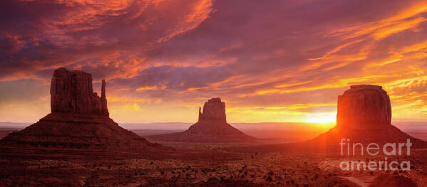Sunrise Sky Poster featuring the photograph The Mittens at Sunrise, Monument Valley Navajo Tribal Park, Arizona, USA by Neale And Judith Clark