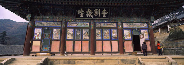 Photography Poster featuring the photograph Buddhist Temple With A Mountain Range by Panoramic Images