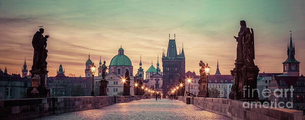 Prague Poster featuring the photograph Charles Bridge at sunrise, Prague, Czech Republic. Dramatic statues and medieval towers. #1 by Michal Bednarek