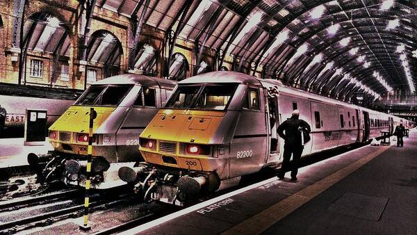 London Poster featuring the photograph Train at London Kingscross Station #1 by Chris Drake