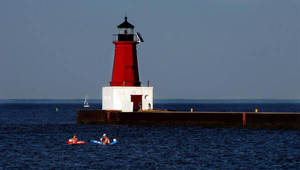 Landscapes Poster featuring the photograph Swimmers At The Lighthouse by Ms Judi
