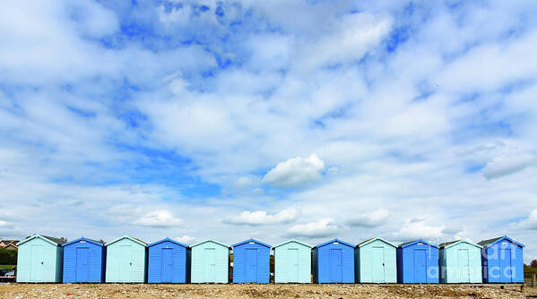 Charmouth Poster featuring the photograph Beach huts #1 by Colin Rayner