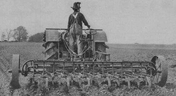 Farm Poster featuring the photograph A Farmer Driving A Tractor by American School