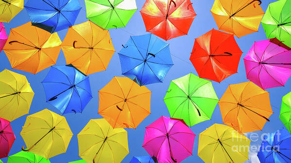 Umbrellas Poster featuring the photograph Colorful Umbrellas I by Raul Rodriguez