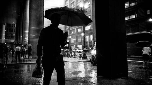 Black Poster featuring the photograph Raining - Chicago, United States - Black and white street photography by Giuseppe Milo