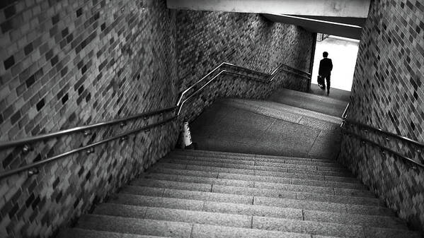 Black Poster featuring the photograph Stairs to subway - Tokyo, Japan - Black and white street photography by Giuseppe Milo