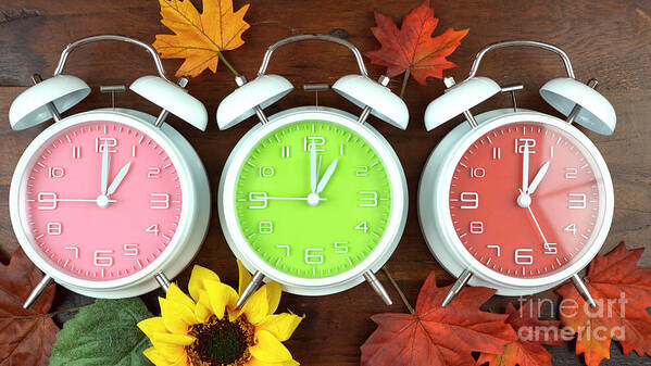 Alarm Poster featuring the photograph Autumn Fall Daylight Saving Time Clocks #1 by Milleflore Images