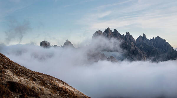 Italian Alps Poster featuring the photograph Mountain landscape with fog in autumn. Tre Cime dolomiti Italy. by Michalakis Ppalis