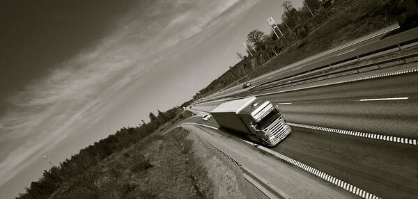 Truck Poster featuring the photograph Trucking On Dark Highway by Christian Lagereek