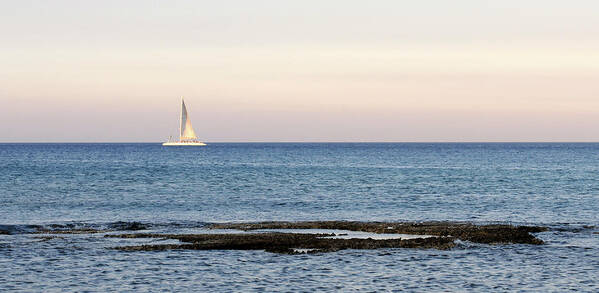 Sea Poster featuring the photograph Sailing boat in the Calm Ocean by Michalakis Ppalis
