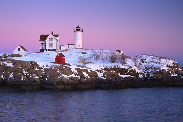 Atlantic Ocean Poster featuring the photograph Nubble Light Under A Pastel Winter Sky by Jeff Sinon