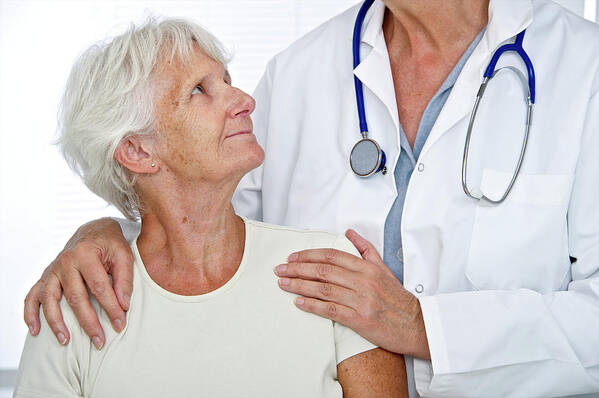 Woman Poster featuring the photograph Elderly Woman With Doctor #1 by Lea Paterson