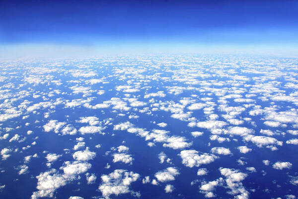 Flying Poster featuring the photograph Above The Clouds by James Knight