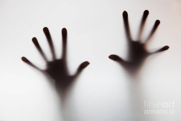 Hands Poster featuring the photograph Hands touching frosted glass #1 by Michal Bednarek