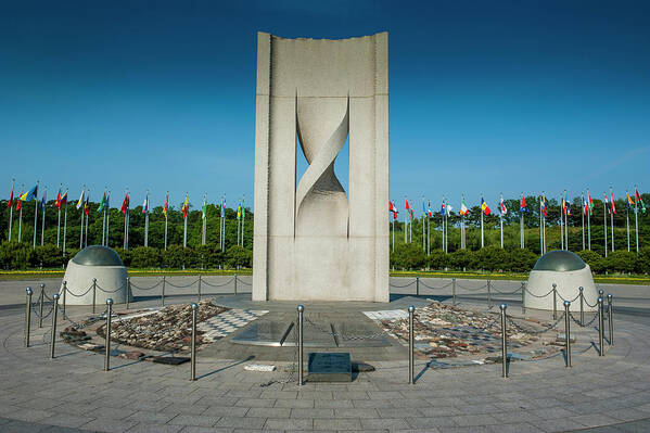 Capital Poster featuring the photograph Monument With Flags At The Olympic #1 by Michael Runkel