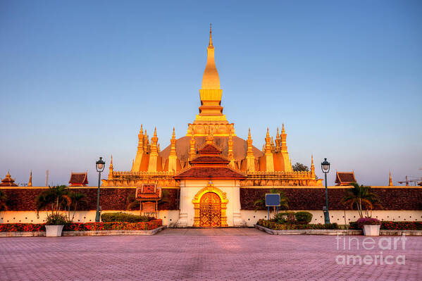 Buddhism Poster featuring the photograph Pha That Luang stupa in Vientiane Laos #1 by Fototrav Print