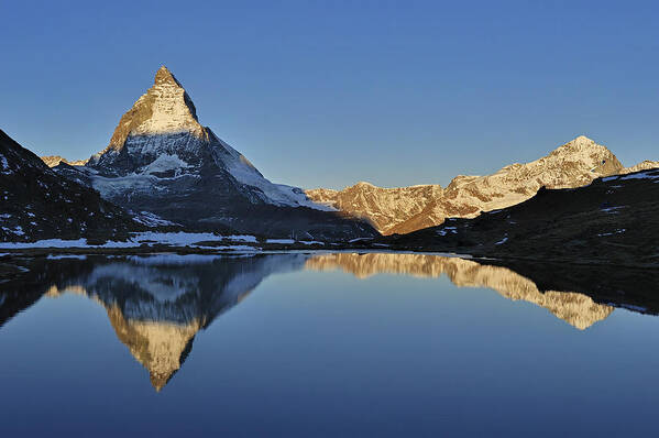 Feb0514 Poster featuring the photograph The Matterhorn And Riffelsee Lake #1 by Thomas Marent