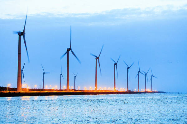 Tranquility Poster featuring the photograph Wind Turbines In Wetland After Sunset #1 by Samyaoo