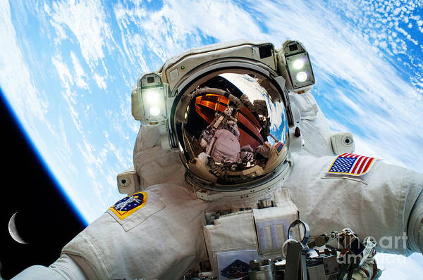 Astronaut Selfie During Spacewalk Poster featuring the photograph Astronaut Selfie During Spacewalk by NASA #1 by Celestial Images