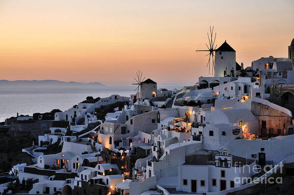 Santorini Poster featuring the photograph Oia town during sunset #2 by George Atsametakis