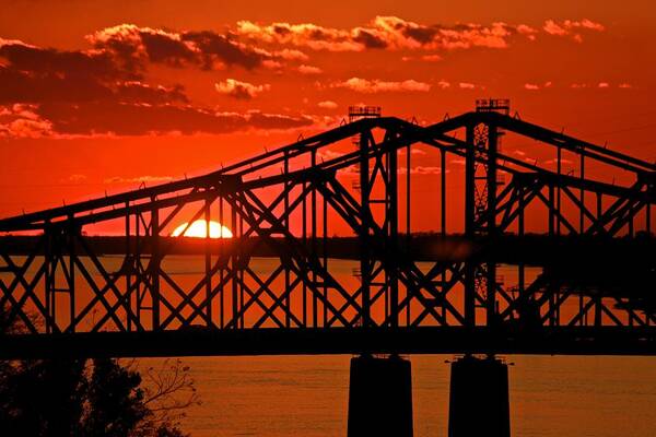 Mississippi Poster featuring the photograph The Mississippi River Bridge at Natchez at sunset. #3 by Jim Albritton