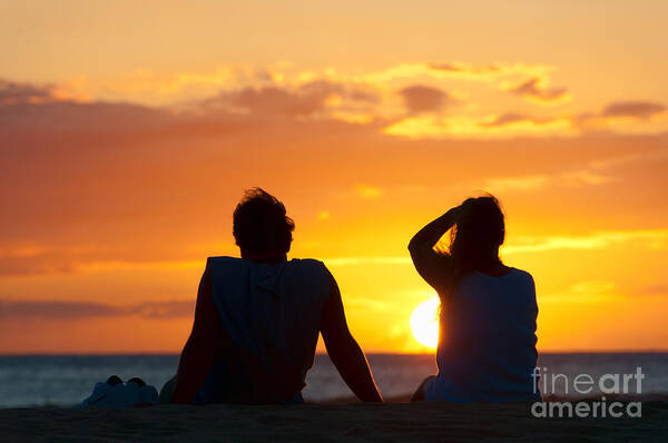 Hawaii Poster featuring the photograph Couple watching the sunset on a beach in Maui Hawaii USA #8 by Don Landwehrle