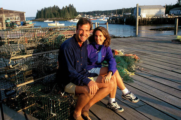 Afternoon Poster featuring the photograph A Couple Sits On Lobster Pots by David McLain