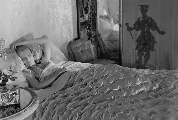 Lifestyle Poster featuring the photograph A Model In A Bed With Designer Bedding by Horst P. Horst
